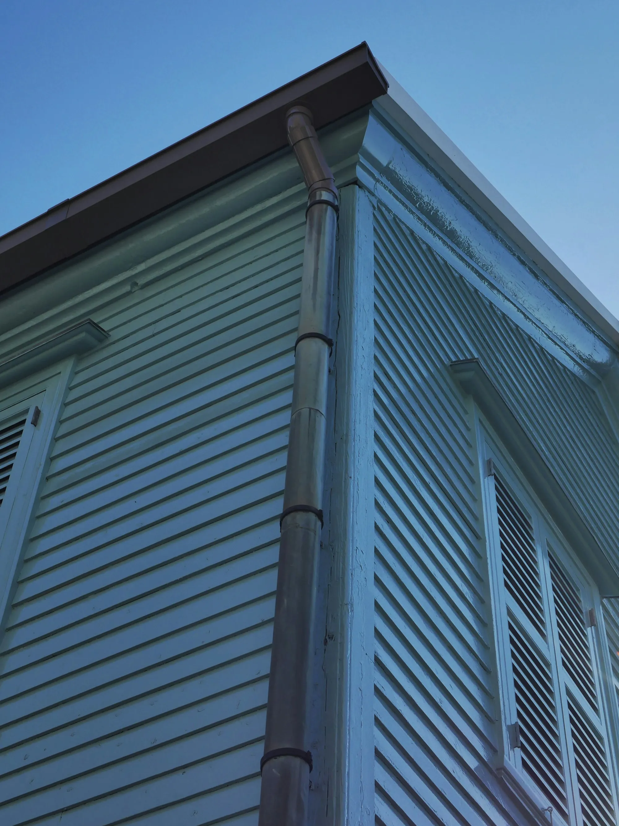 Downspout running down the corner of a house