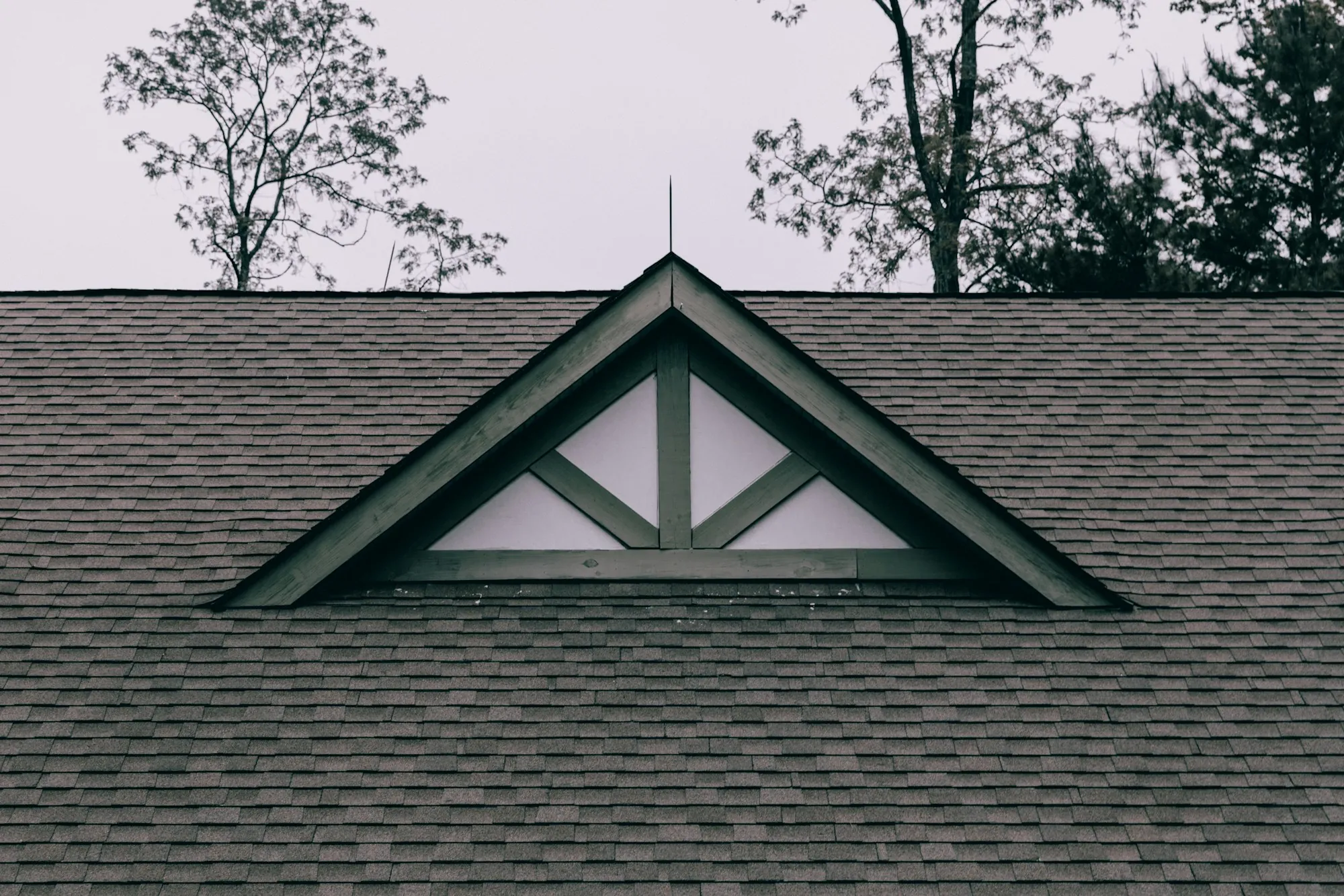 Pitched roof with a triangular gable window